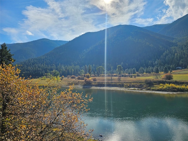 4743 Sloway Frontage Rd, Superior, MT 59872 - mountain view featuring a forest and a large body of water
