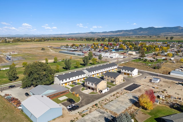 drone / aerial view of a mountainous background
