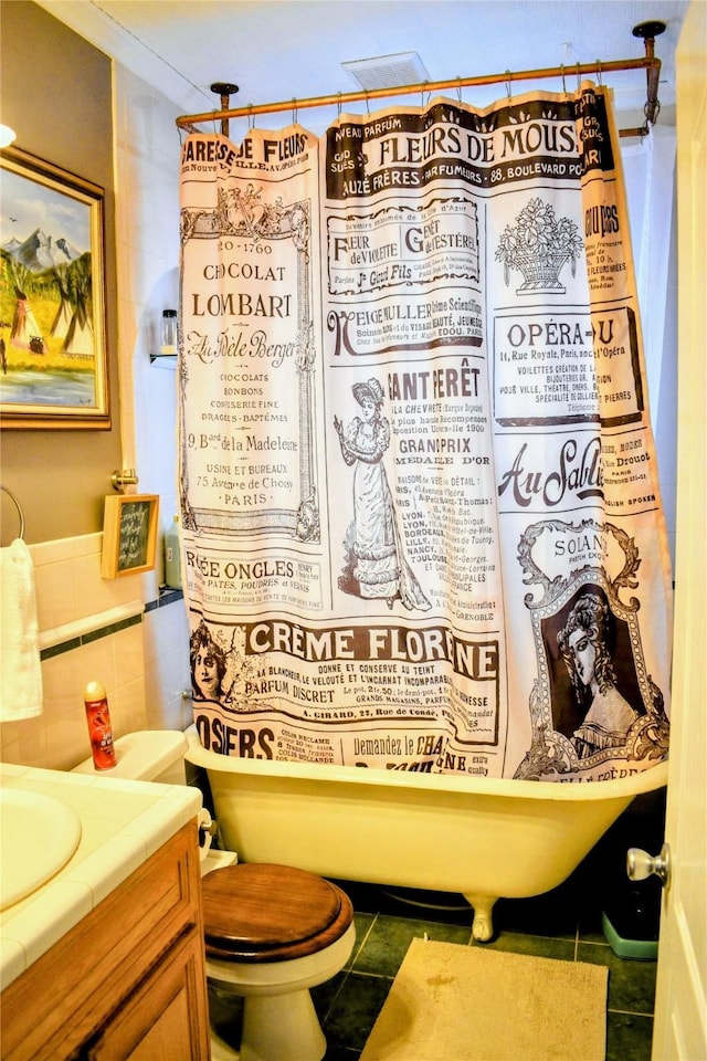 1314 Dakota Ave, Libby, MT 59923 - bathroom featuring vanity, toilet, and tile patterned floors