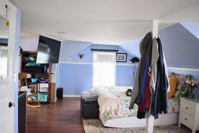 1314 Dakota Ave, Libby, MT 59923 - bedroom with wood finished floors, a wainscoted wall, and vaulted ceiling