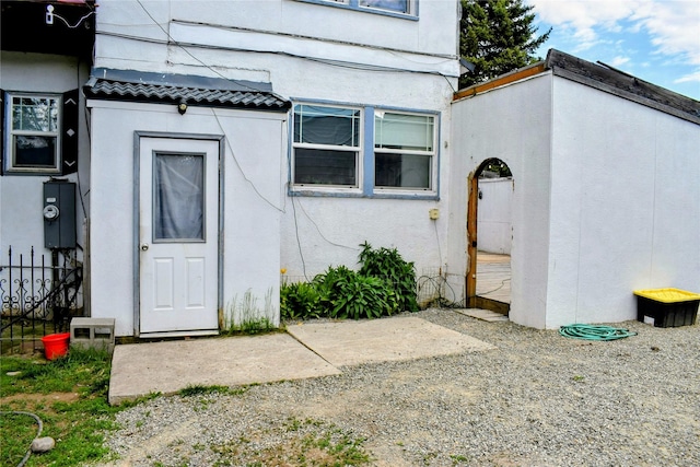 1314 Dakota Ave, Libby, MT 59923 - entrance to property with stucco siding