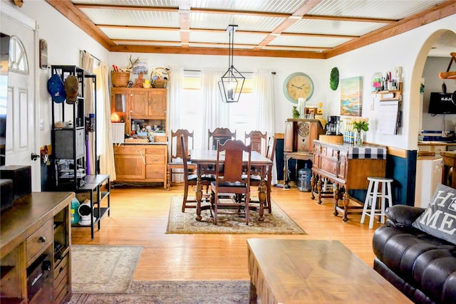 1314 Dakota Ave, Libby, MT 59923 - dining area with light wood finished floors and arched walkways
