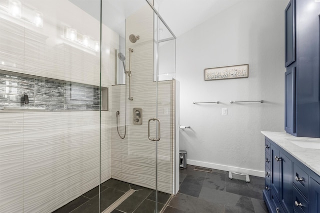 1815 Homestead Dr, Missoula, MT 59808 - bathroom featuring a shower stall, vanity, baseboards, and tile patterned flooring