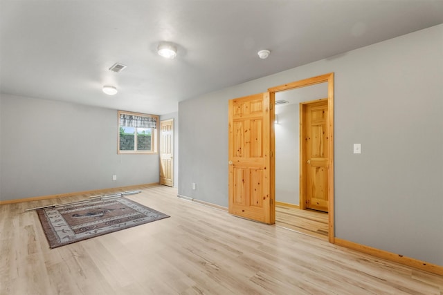 1815 Homestead Dr, Missoula, MT 59808 - unfurnished room featuring wood finished floors and baseboards