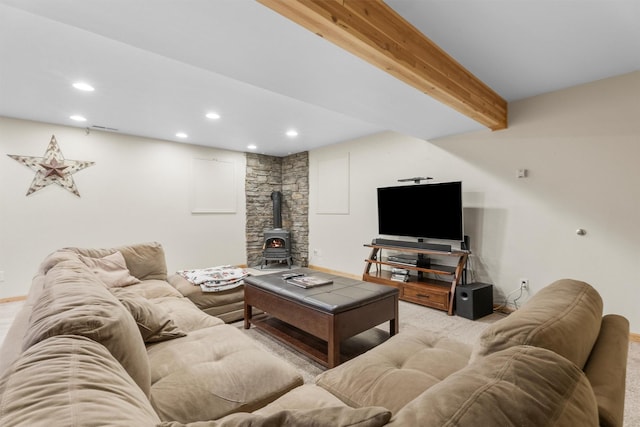 1815 Homestead Dr, Missoula, MT 59808 - living room with a wood stove, recessed lighting, baseboards, beamed ceiling, and carpet floors
