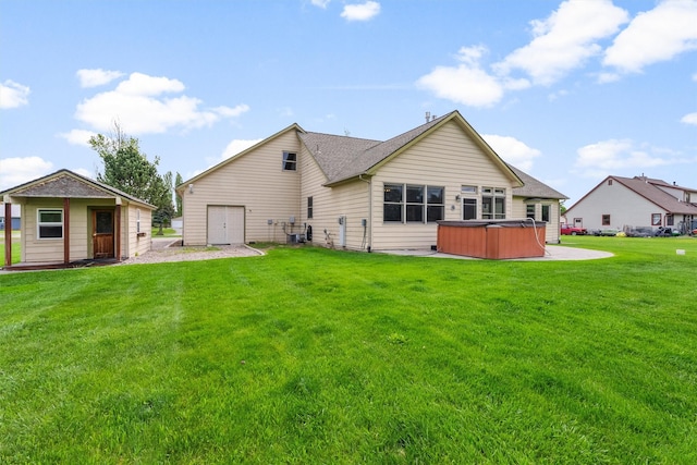 1815 Homestead Dr, Missoula, MT 59808 - rear view of property with a hot tub, a yard, an outbuilding, and a patio area