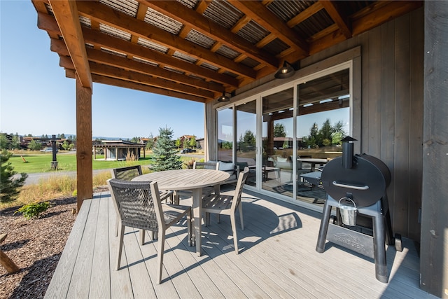 34 Park Cottage Way, Eureka, MT 59917 - wooden deck featuring outdoor dining area