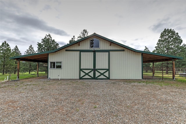 view of outdoor structure with an outdoor structure and fence