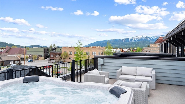 317 Central Ave Unit 302, Whitefish, MT 59937 - view of patio / terrace with a balcony, a residential view, and a mountain view
