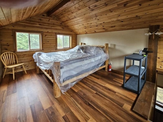 765 Trail Creek Rd, Polebridge, MT 59928 - bedroom featuring hardwood / wood-style flooring, vaulted ceiling, wood walls, and wood ceiling