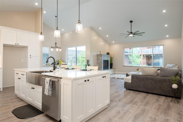 412 White Fox Run, Polson, MT 59860 - kitchen with dishwasher, high vaulted ceiling, open floor plan, a sink, and ceiling fan