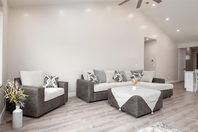 412 White Fox Run, Polson, MT 59860 - living room with ceiling fan, baseboards, light wood finished floors, beamed ceiling, and recessed lighting