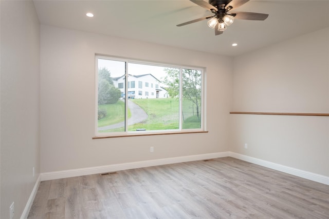 412 White Fox Run, Polson, MT 59860 - empty room featuring light wood finished floors, baseboards, recessed lighting, and a ceiling fan