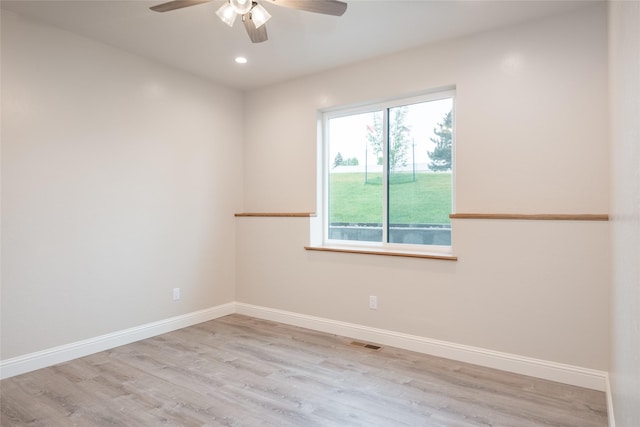 412 White Fox Run, Polson, MT 59860 - spare room featuring ceiling fan, wood finished floors, baseboards, and recessed lighting
