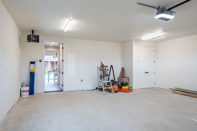 412 White Fox Run, Polson, MT 59860 - garage featuring a garage door opener