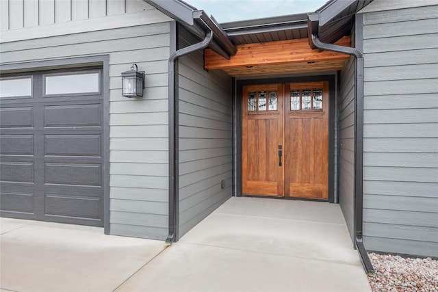 412 White Fox Run, Polson, MT 59860 - doorway to property with a garage