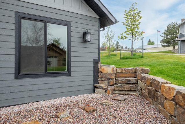 412 White Fox Run, Polson, MT 59860 - view of property exterior featuring a lawn