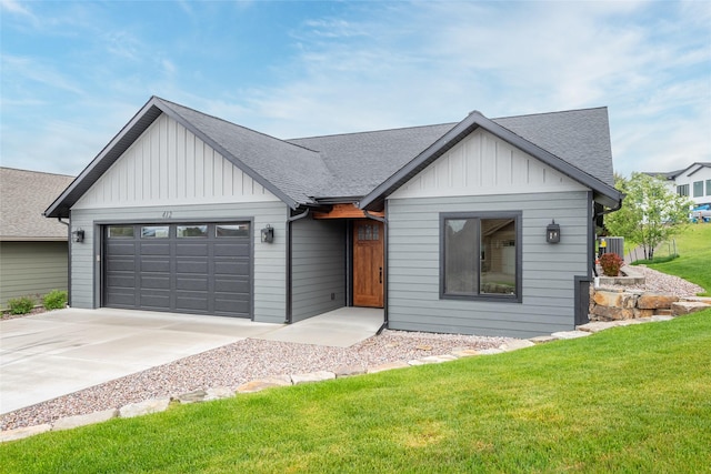 412 White Fox Run, Polson, MT 59860 - modern inspired farmhouse featuring board and batten siding, driveway, roof with shingles, and a garage