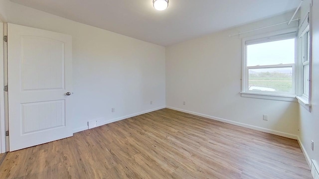 1240 Cannon St, Helena, MT 59601 - spare room featuring light wood-type flooring and baseboards