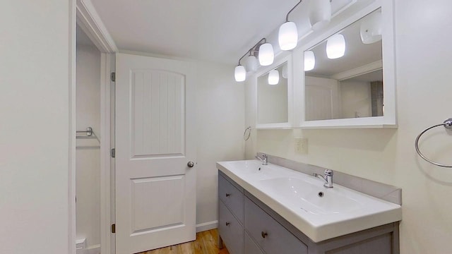 1240 Cannon St, Helena, MT 59601 - full bath featuring double vanity and wood finished floors