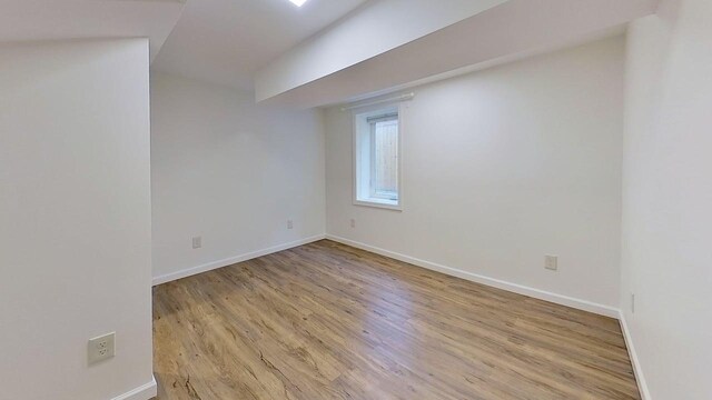 1240 Cannon St, Helena, MT 59601 - spare room featuring wood finished floors and baseboards