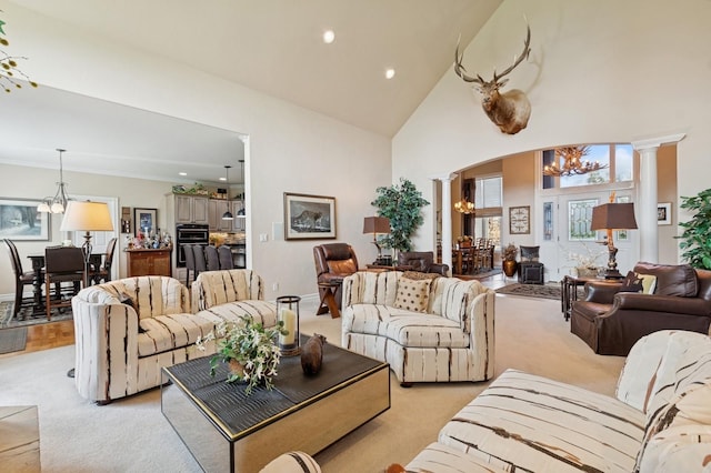 1225 Quail Ridge Dr, Kalispell, MT 59901 - living area with a chandelier, decorative columns, healthy amount of natural light, recessed lighting, and a high ceiling