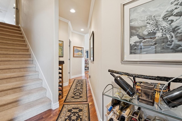 1225 Quail Ridge Dr, Kalispell, MT 59901 - hall featuring stairway, ornamental molding, wood finished floors, and recessed lighting