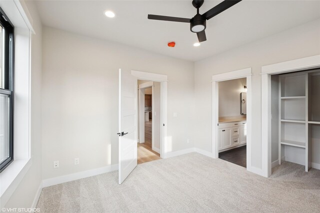168 Wood Ridge Dr, Columbia Falls, MT 59912 - unfurnished bedroom with carpet, ensuite bathroom, recessed lighting, and a ceiling fan