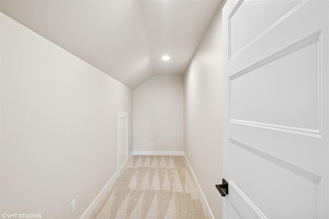 168 Wood Ridge Dr, Columbia Falls, MT 59912 - bonus room with lofted ceiling, light carpet, and recessed lighting