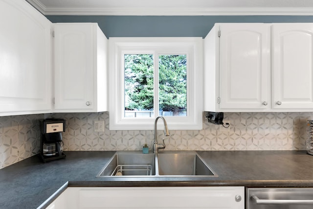 4003 Thomas Pl, Missoula, MT 59803 - kitchen with a sink, dark countertops, dishwasher, white cabinetry, and crown molding