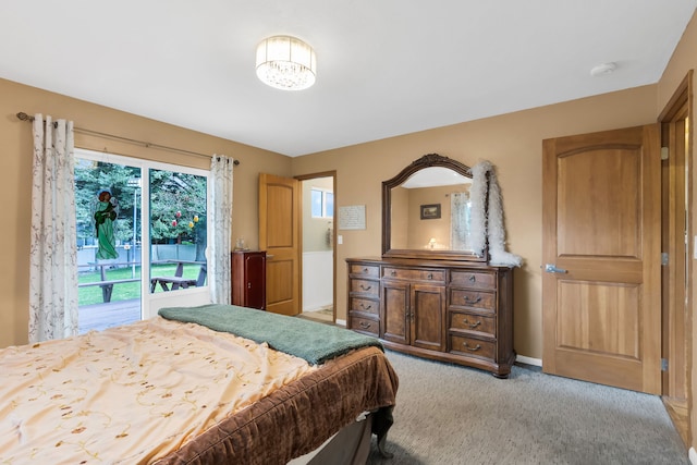 4003 Thomas Pl, Missoula, MT 59803 - bedroom with access to exterior and light colored carpet