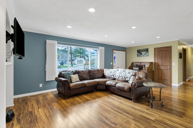 4003 Thomas Pl, Missoula, MT 59803 - living area with crown molding, wood finished floors, baseboards, and recessed lighting