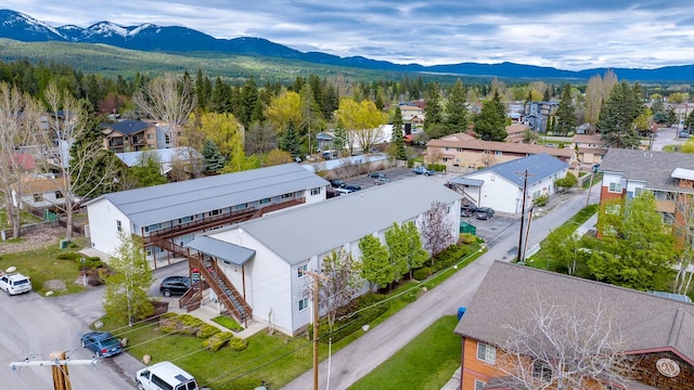 aerial view of residential area with a mountainous background