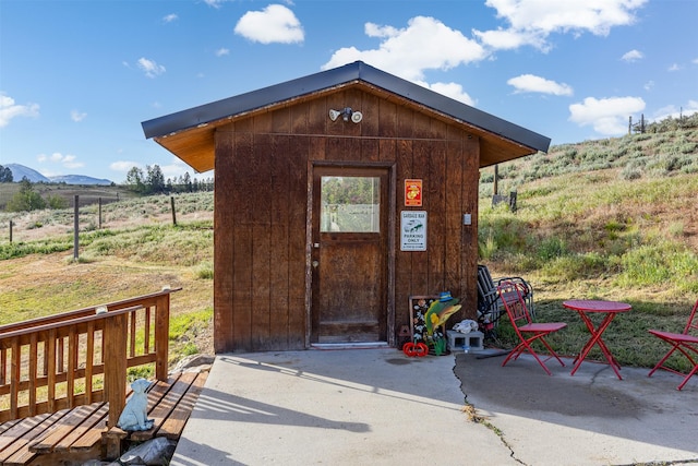 688 Black Horse Trl, Stevensville, MT 59870 - view of outdoor structure featuring an outdoor structure and a mountain view