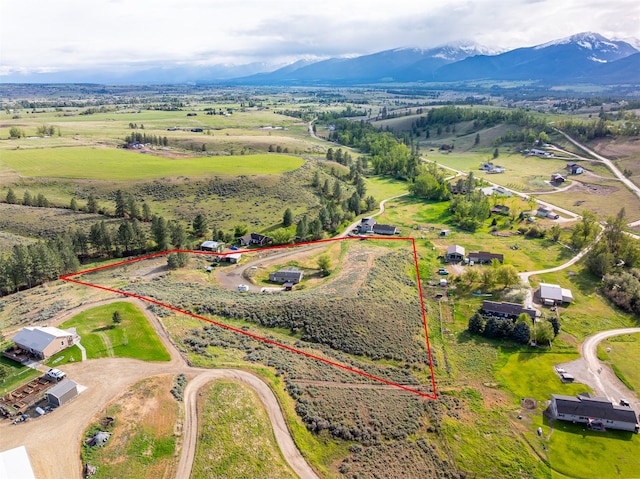 688 Black Horse Trl, Stevensville, MT 59870 - overview of rural landscape featuring a mountainous background and property parcel outlined
