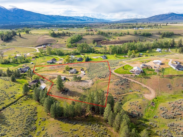 688 Black Horse Trl, Stevensville, MT 59870 - view of rural area featuring a mountain backdrop and property boundaries highlighted