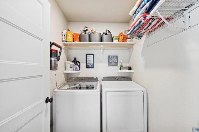 laundry room with separate washer and dryer