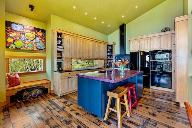 32220 Tamarack Dr, Bigfork, MT 59911 - kitchen with dark countertops, dark wood-style floors, freestanding refrigerator, light brown cabinets, and high vaulted ceiling