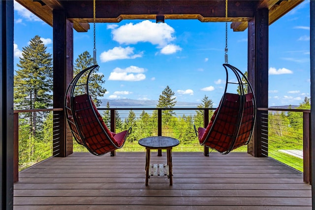 32220 Tamarack Dr, Bigfork, MT 59911 - wooden terrace featuring a water view