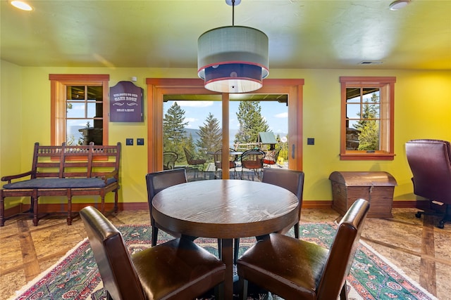 32220 Tamarack Dr, Bigfork, MT 59911 - dining area featuring baseboards and recessed lighting