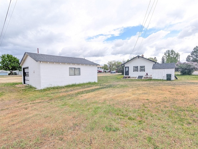 403 Mission St, Stevensville, MT 59870 - view of green lawn with an outbuilding