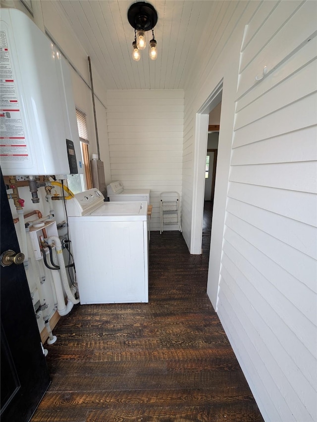 403 Mission St, Stevensville, MT 59870 - clothes washing area featuring water heater, independent washer and dryer, and dark wood-style floors