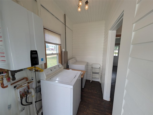 403 Mission St, Stevensville, MT 59870 - clothes washing area with water heater, washer and dryer, dark wood finished floors, and wood ceiling
