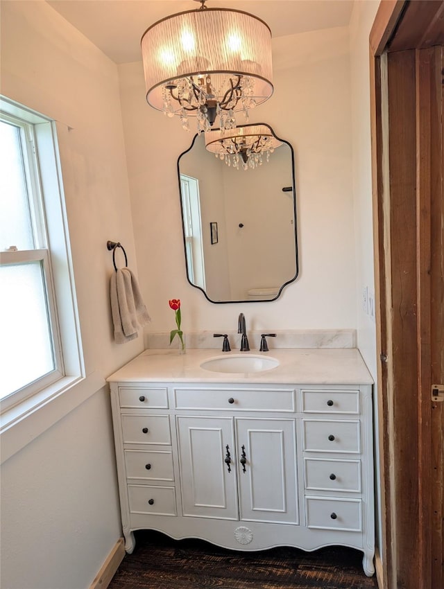 403 Mission St, Stevensville, MT 59870 - bathroom featuring vanity and a chandelier