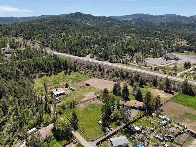 38 Lakeside Ave, Lakeside, MT 59922 - drone / aerial view of a heavily wooded area and a mountainous background