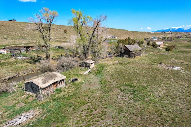 405 Lower Deep Creek Rd, Townsend, MT 59644 - view of yard featuring an outdoor structure, a view of countryside, and a mountain view