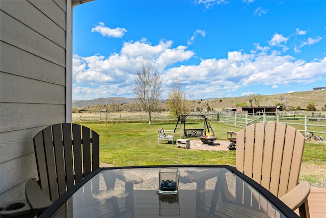 405 Lower Deep Creek Rd, Townsend, MT 59644 - view of grassy yard with a view of countryside, a mountain view, an outbuilding, and an exterior structure