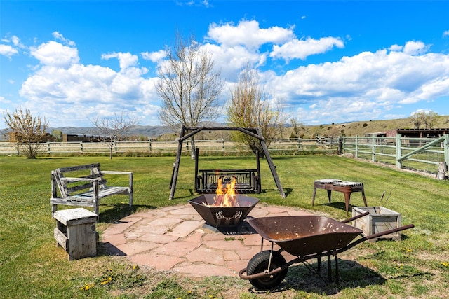 405 Lower Deep Creek Rd, Townsend, MT 59644 - view of patio / terrace featuring an outdoor fire pit and a rural view