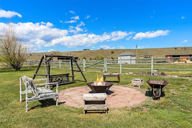 405 Lower Deep Creek Rd, Townsend, MT 59644 - view of yard featuring a fire pit and a rural view