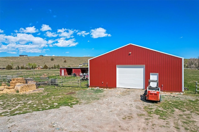 405 Lower Deep Creek Rd, Townsend, MT 59644 - view of pole building with driveway and a view of rural / pastoral area